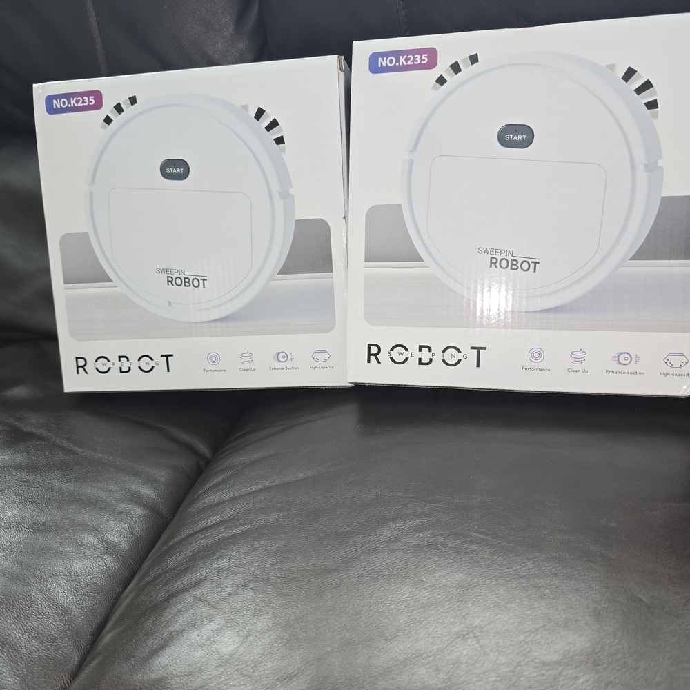 White Robot Vacuum Cleaner
